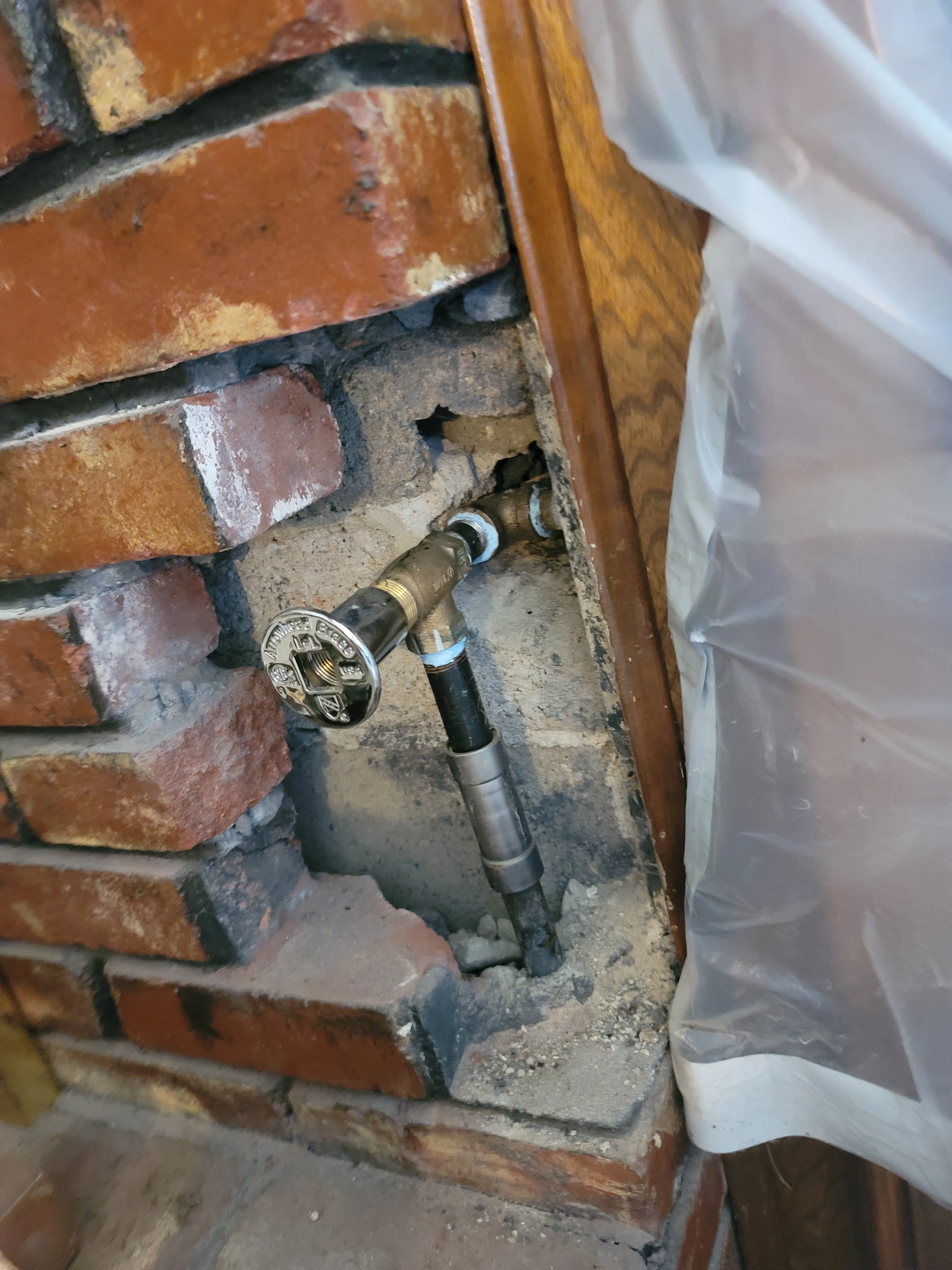 Before repair photo of Tulsa fireplace with gas valve issue