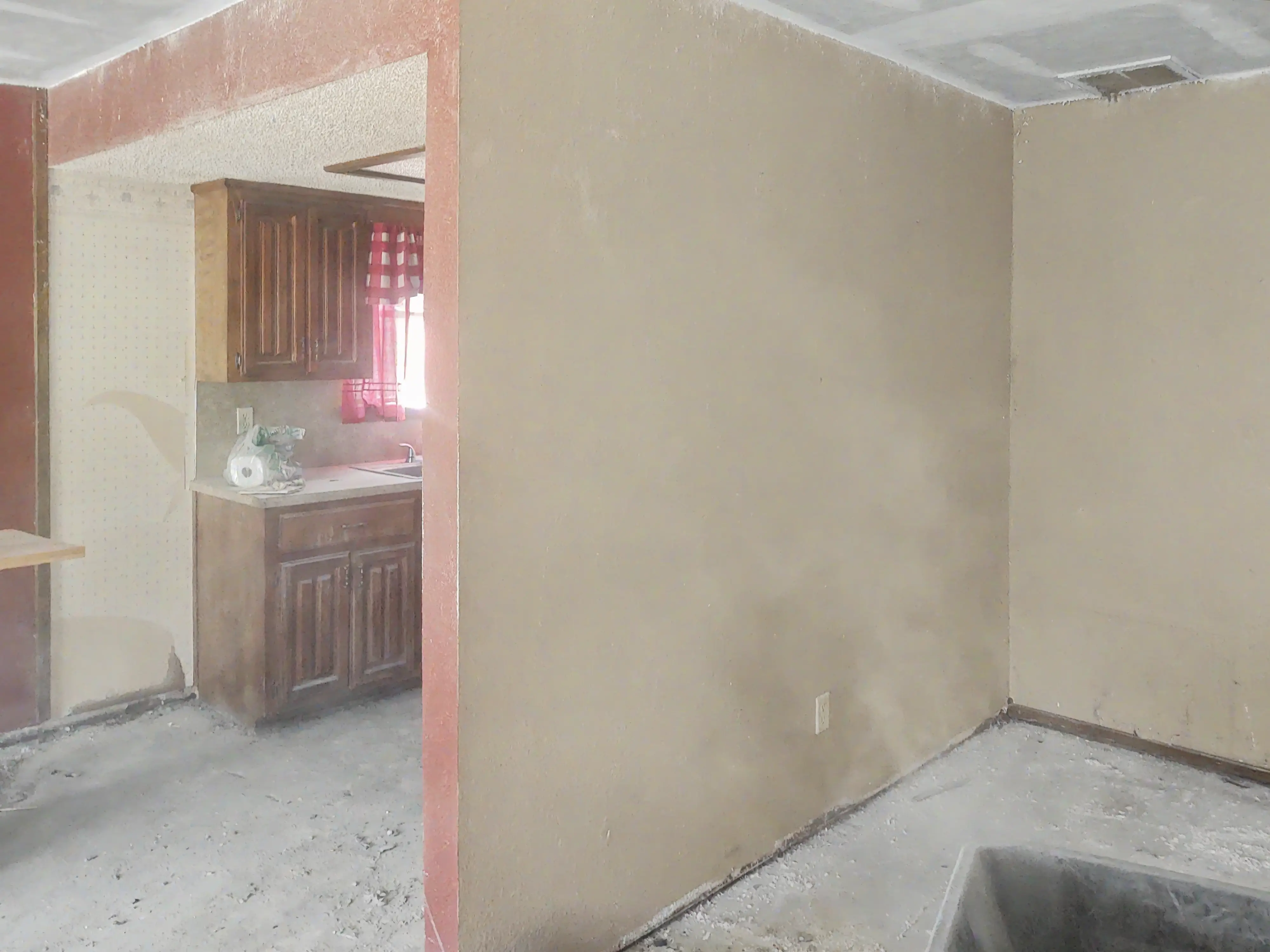 Before living space in Tulsa before wall removal and open-concept remodel work